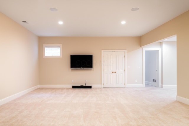 basement with light colored carpet