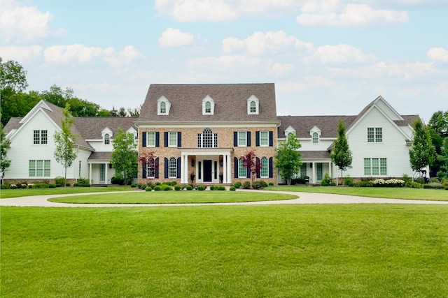 view of front facade with a front lawn