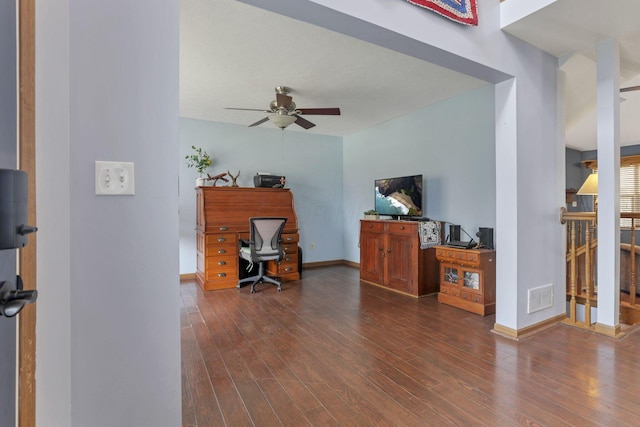 office with dark hardwood / wood-style floors and ceiling fan