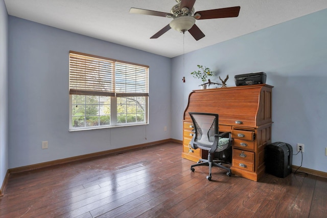 office area featuring ceiling fan and dark hardwood / wood-style flooring