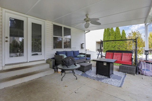 view of patio / terrace with an outdoor living space and ceiling fan