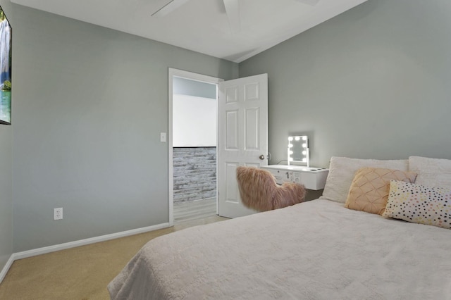 bedroom with ceiling fan and carpet