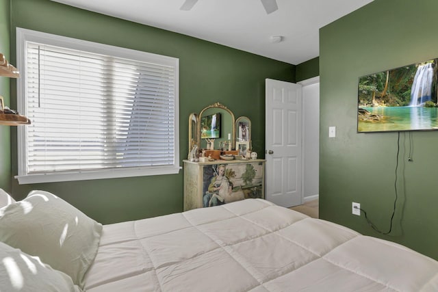 bedroom featuring ceiling fan