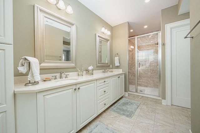 bathroom with vanity and walk in shower