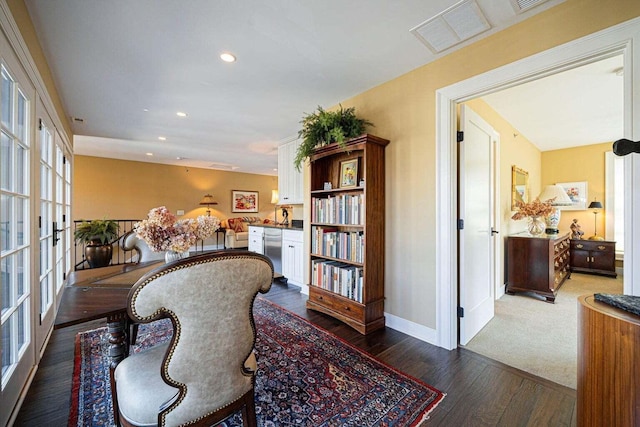 interior space with french doors and dark wood-type flooring