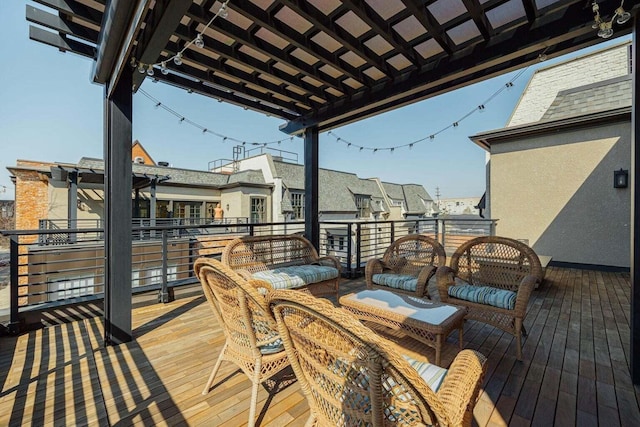 deck with a pergola and an outdoor hangout area