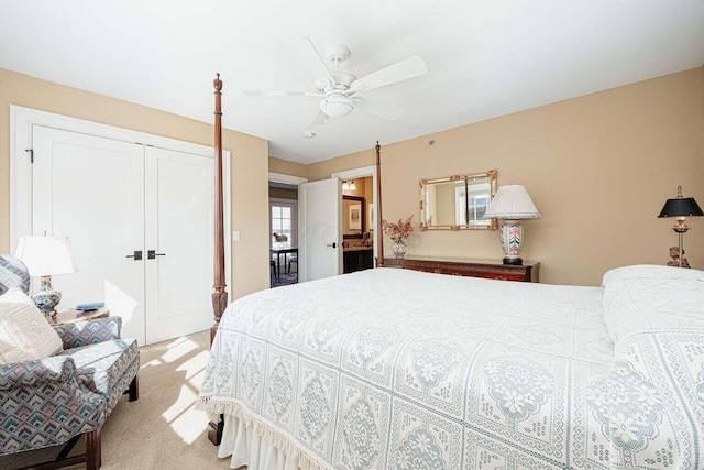 bedroom with light carpet, a closet, and ceiling fan