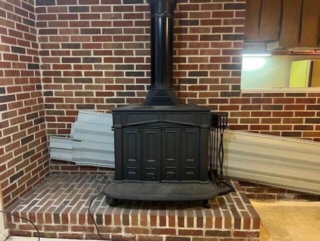 interior details featuring a wood stove