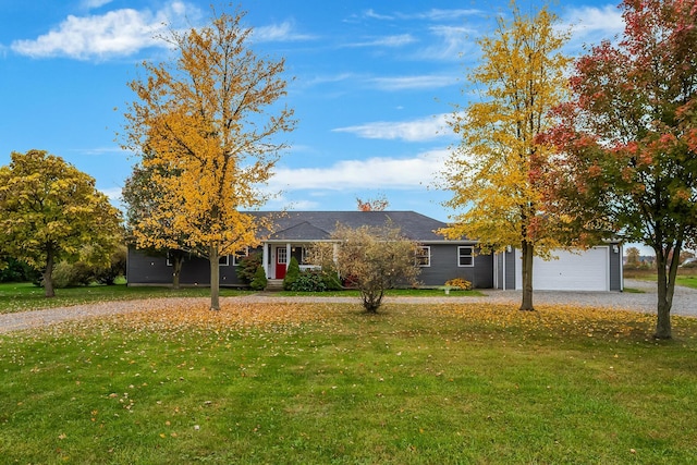 view of front facade featuring a garage and a front lawn