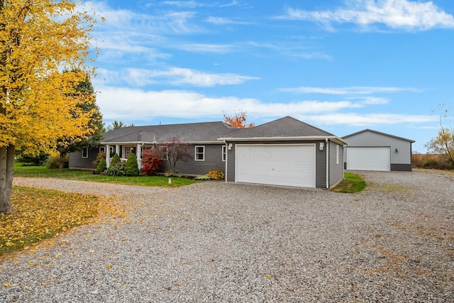 ranch-style house featuring a garage