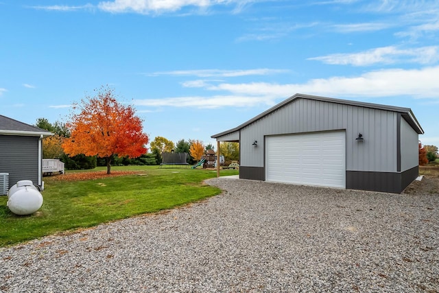 garage with a lawn