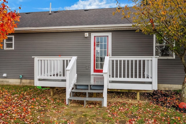 rear view of house with a deck