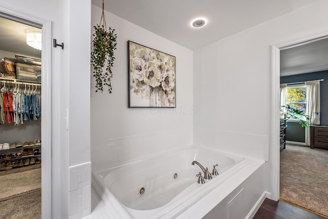 bathroom featuring a washtub