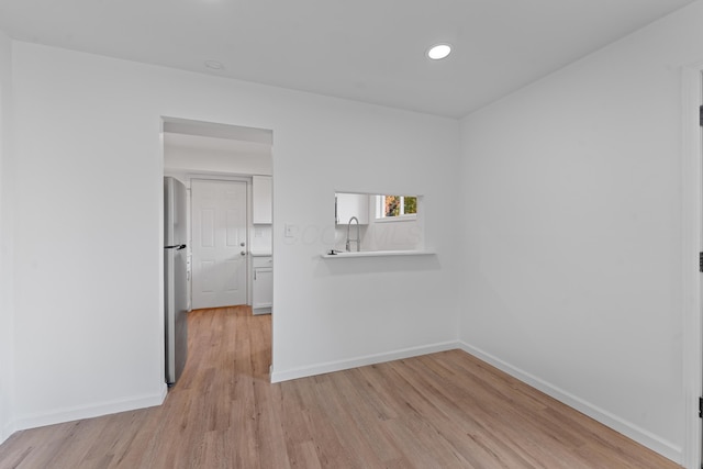 empty room featuring light hardwood / wood-style flooring