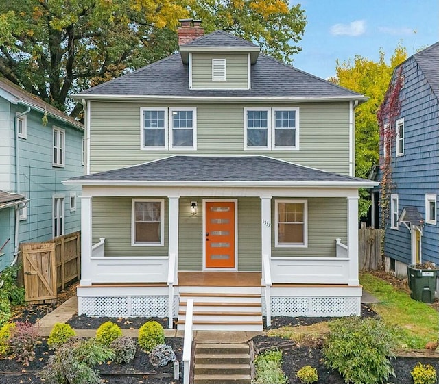 1337 N 5th St, Columbus, OH 43201 - traditional style home featuring covered porch, a chimney, and roof with shingles