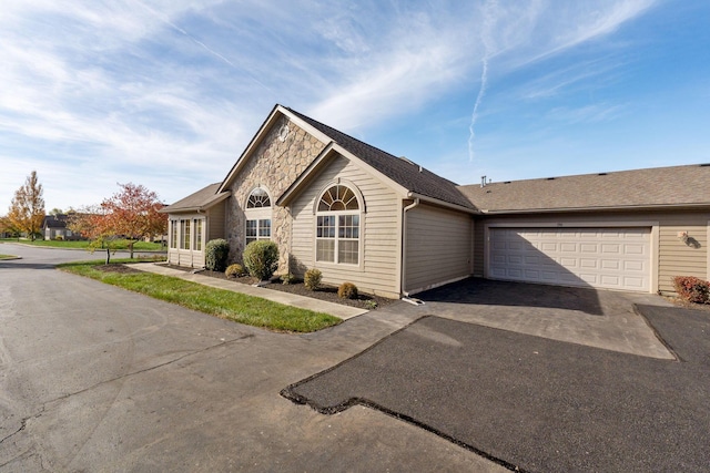 ranch-style house with a garage