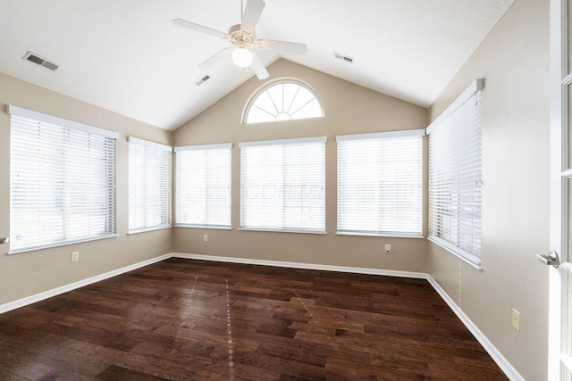 unfurnished sunroom featuring ceiling fan and vaulted ceiling