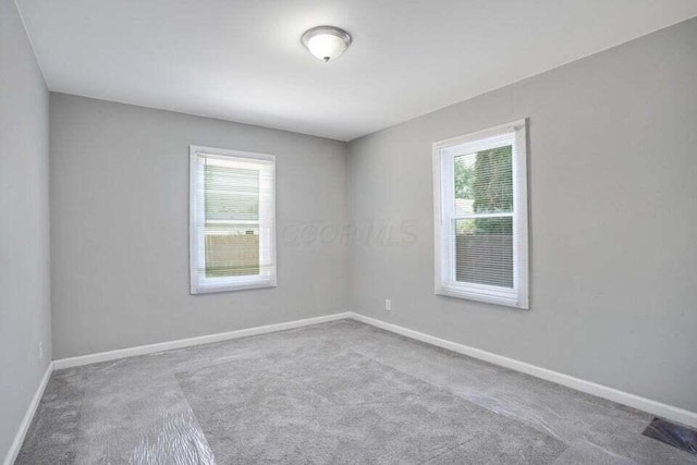 view of carpeted spare room