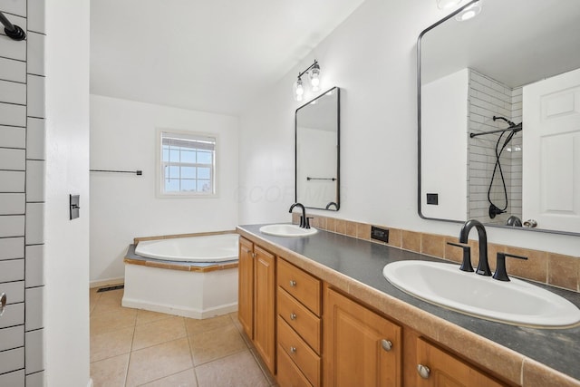 bathroom with tile patterned flooring, vanity, and independent shower and bath