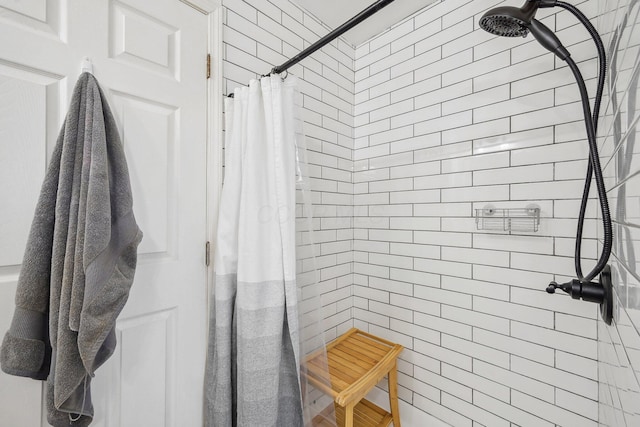 bathroom with a shower with curtain