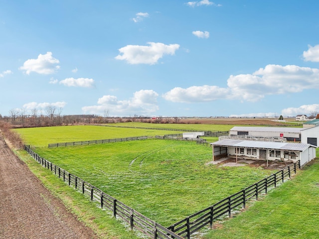 view of yard with a rural view