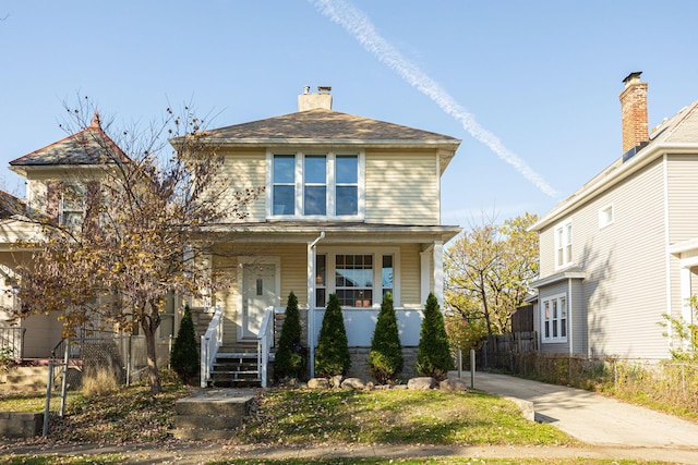 view of front property with covered porch