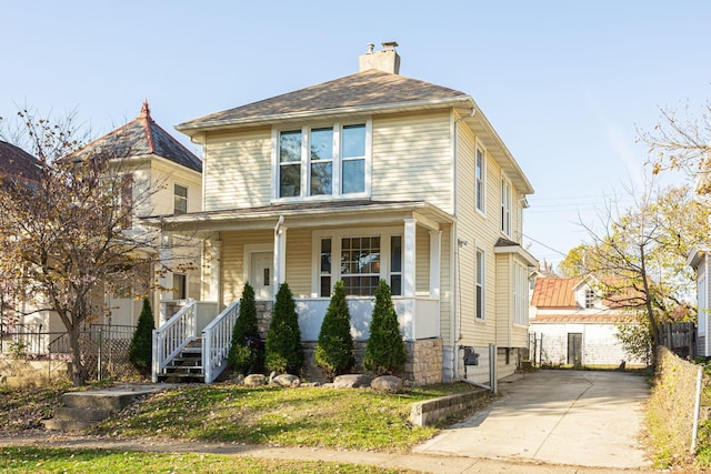 view of property with a porch