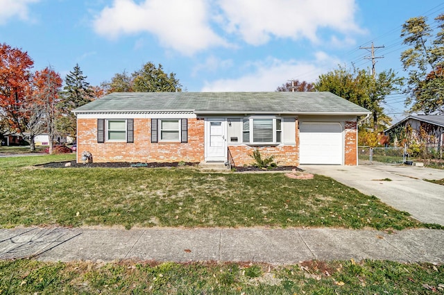 single story home with a front yard and a garage