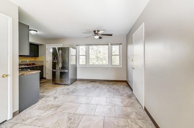 kitchen with stainless steel refrigerator with ice dispenser and ceiling fan