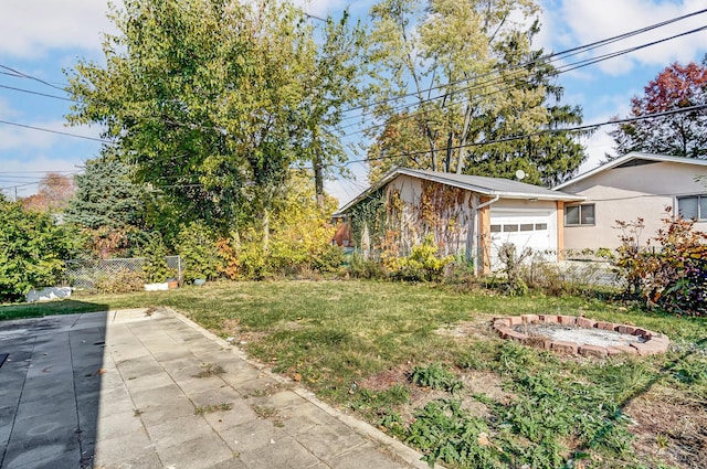 view of yard with a garage