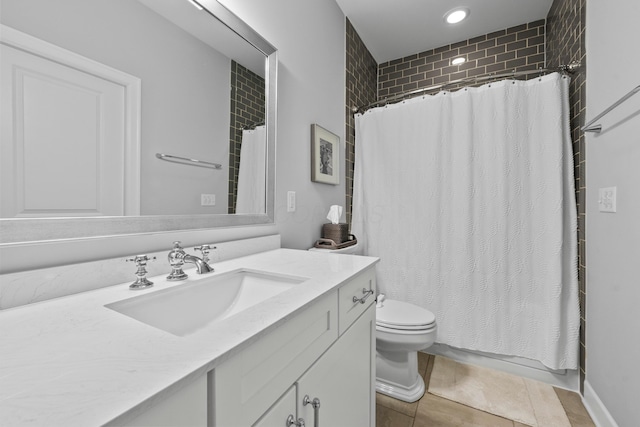 bathroom featuring tile patterned floors, vanity, toilet, and a shower with curtain