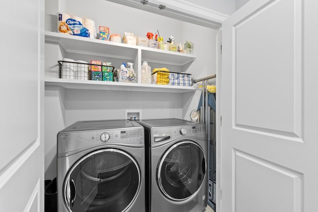 laundry area featuring washing machine and dryer