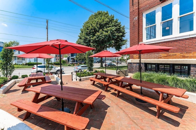 view of property's community with a patio