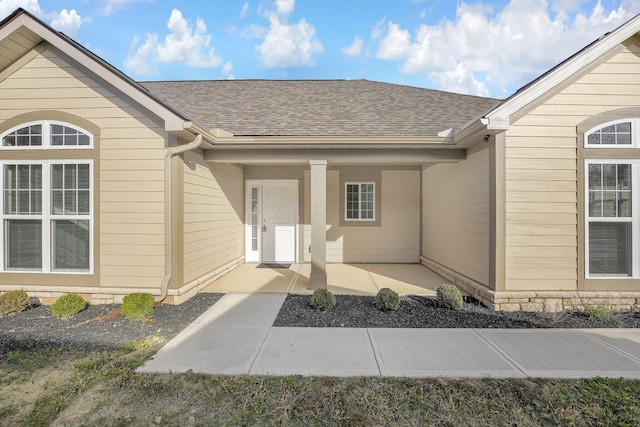 entrance to property with a patio