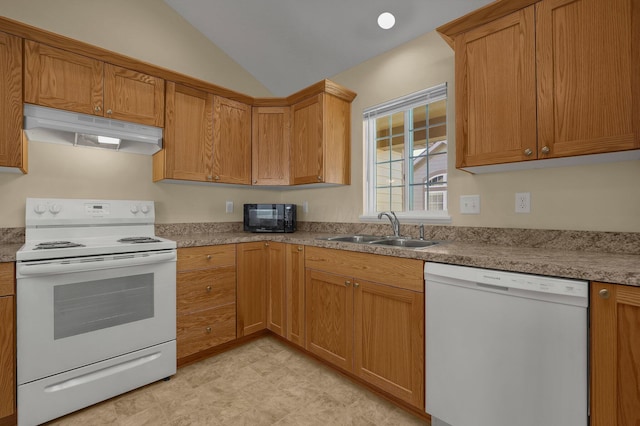 kitchen with vaulted ceiling, sink, and white appliances