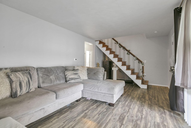 living room with dark hardwood / wood-style floors