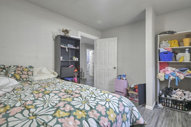 bedroom featuring hardwood / wood-style flooring