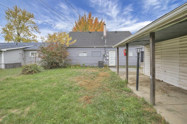 view of yard with central AC unit