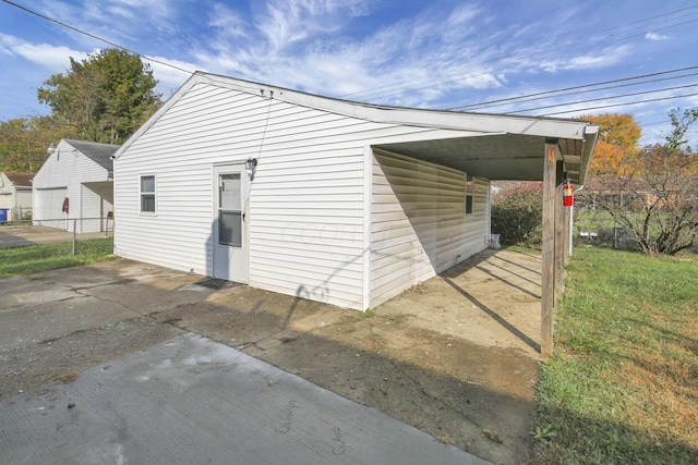 exterior space featuring a carport