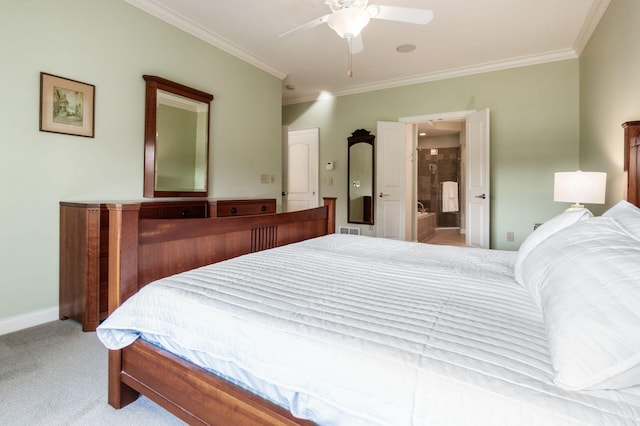 carpeted bedroom featuring ensuite bath, ceiling fan, and ornamental molding