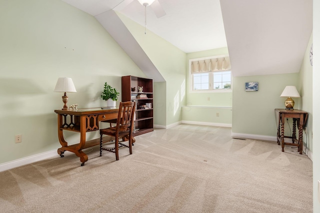 sitting room with ceiling fan, light colored carpet, and lofted ceiling