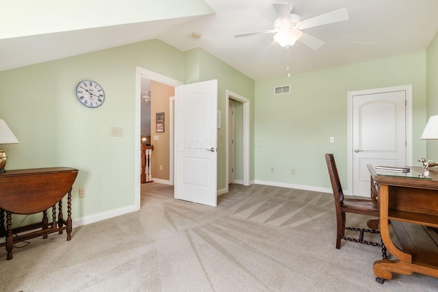 office with light carpet, ceiling fan, and vaulted ceiling