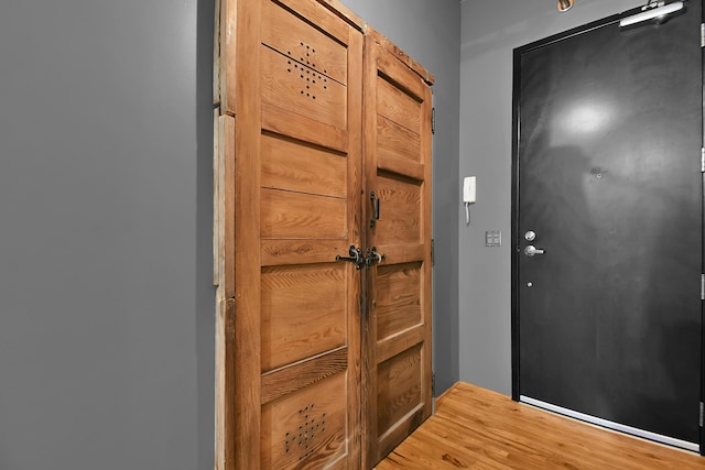 doorway to outside with hardwood / wood-style floors