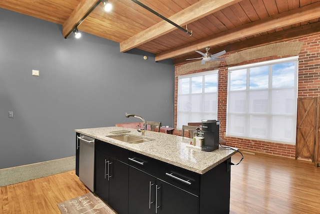 kitchen with beamed ceiling, wooden ceiling, sink, and brick wall