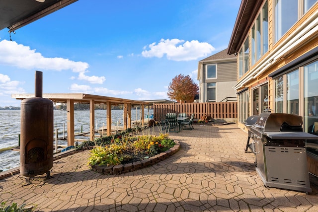 view of patio / terrace featuring a water view