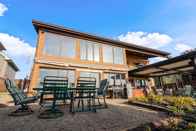 rear view of house with a patio