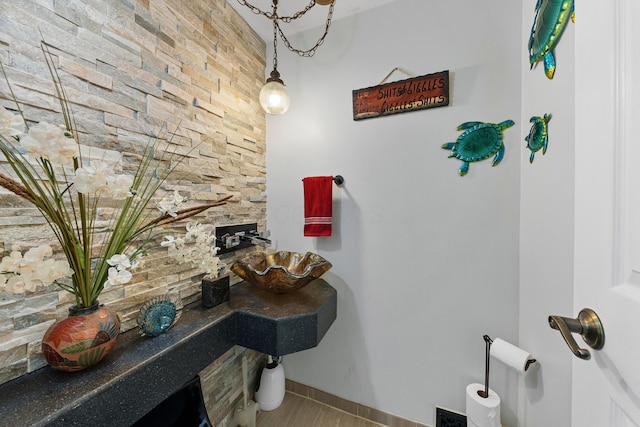 bathroom featuring hardwood / wood-style flooring