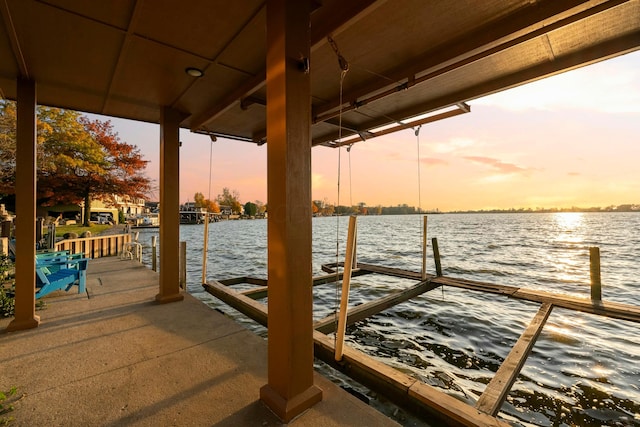 view of dock with a water view