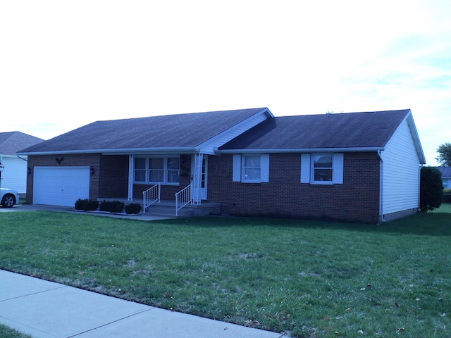 ranch-style house featuring a garage and a front yard