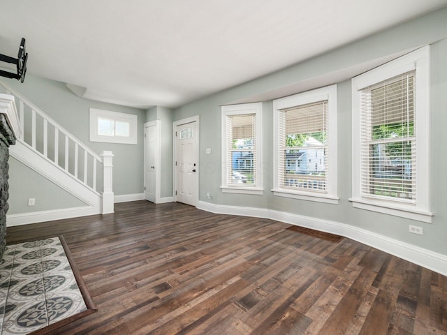 foyer entrance featuring dark hardwood / wood-style flooring